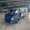 Hình ảnh xe tải Hyundai New Porter H150 thùng lừng đạu trong bãi đổ xe